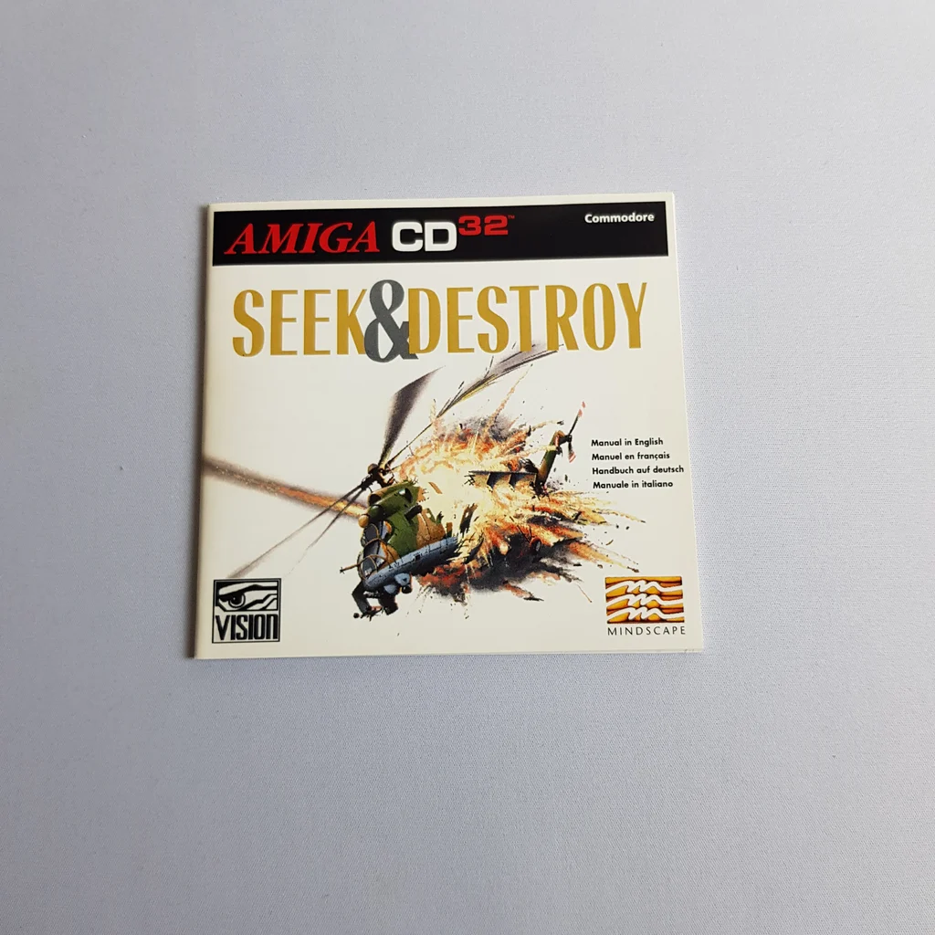 Seek & Destroy Amiga CD32 kézikönyv borító Seek & Destroy Amiga CD32 videojáték kézikönyvének borítója, helikopteres robbanással.