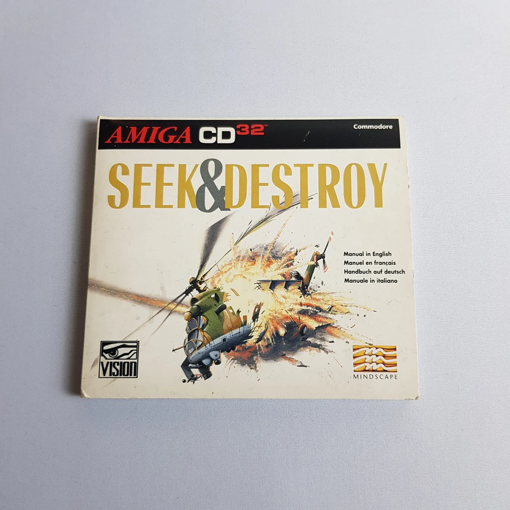Seek & Destroy Amiga CD32 kézikönyv előlap Seek & Destroy Amiga CD32 videojáték kézikönyvének előlapja, helikopteres akciójelenettel.