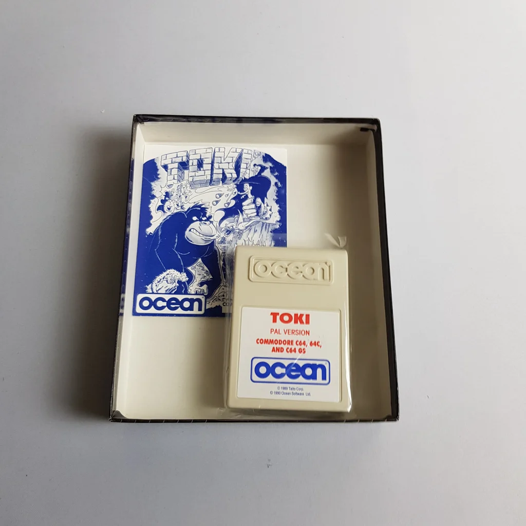 Toki Commodore 64 játék doboz tartalma Toki Commodore 64 játék doboz, benne kazetta és kézikönyv