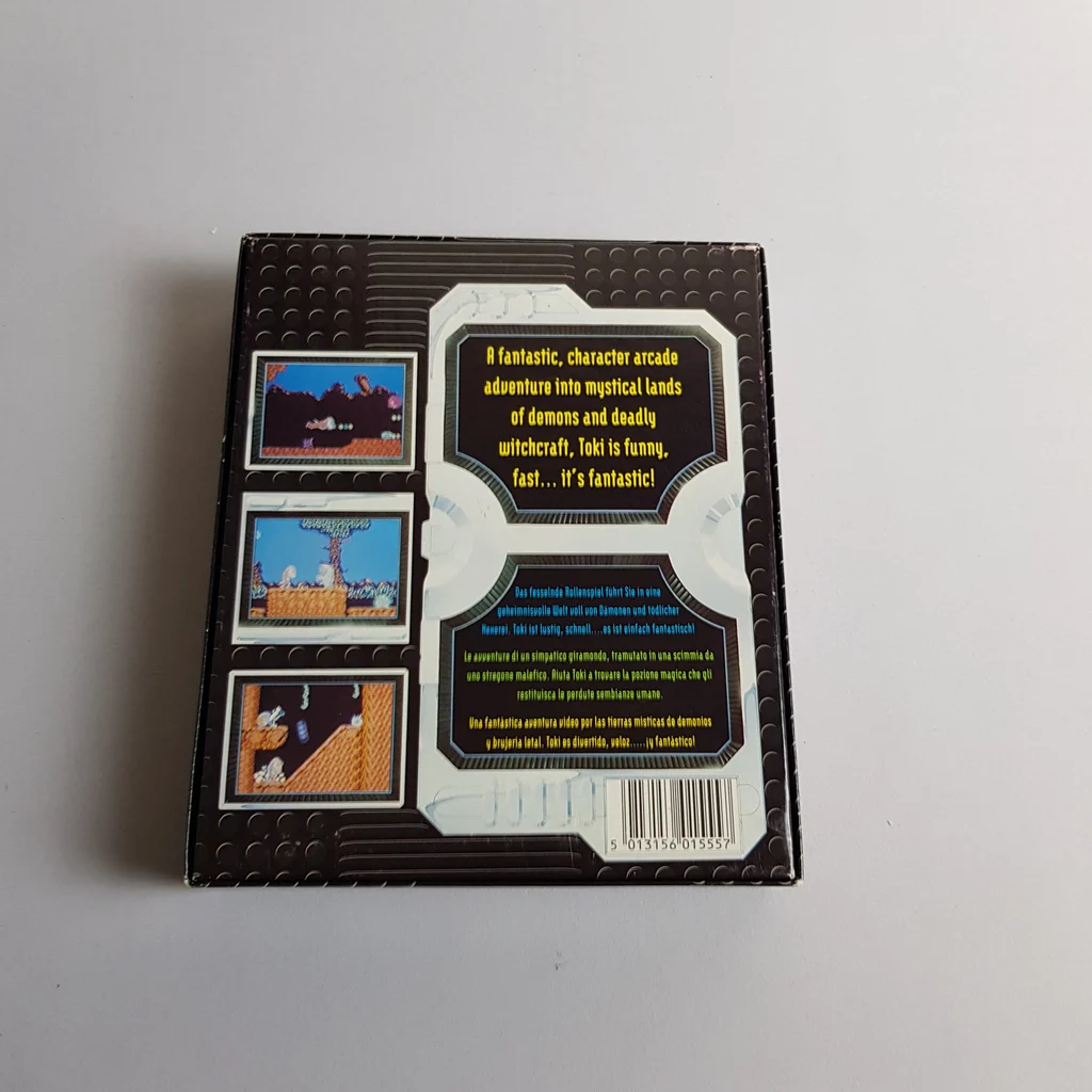 Toki Commodore 64 játék doboz hátulja Toki Commodore 64 játék doboz hátlapja képernyőképekkel és leírással